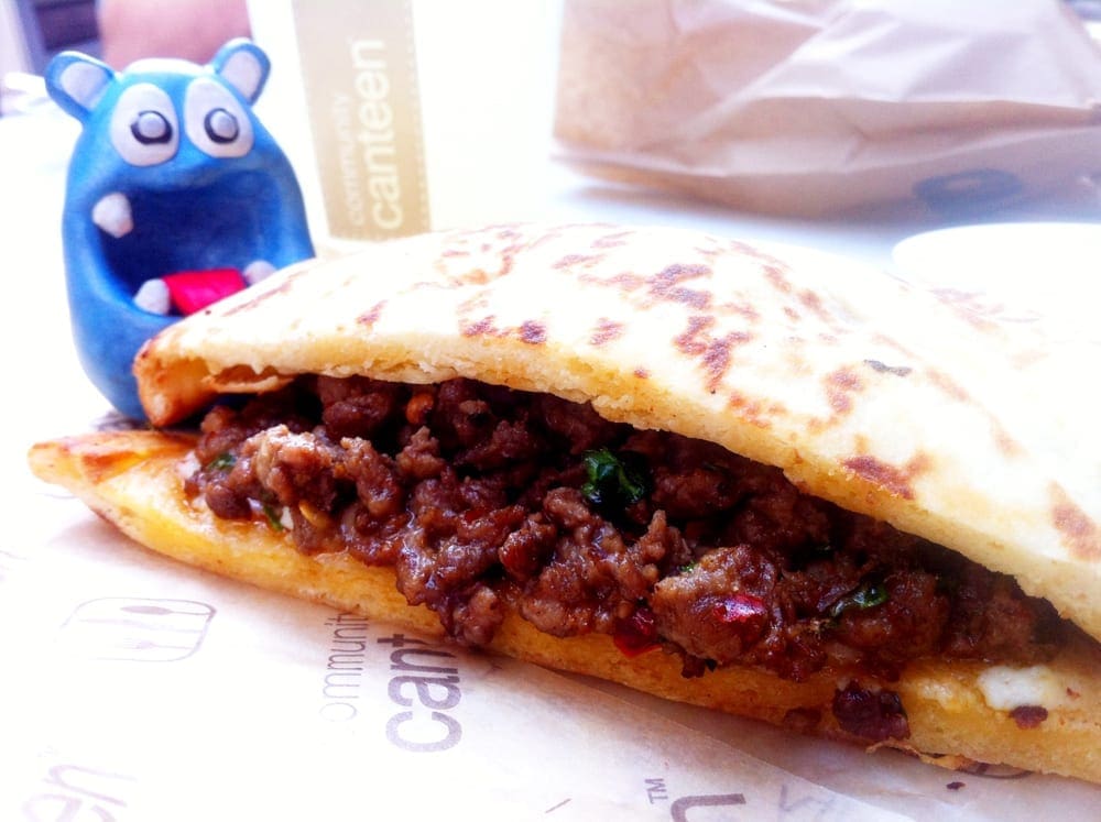 Spicy Lamb on Naan Bread from Community Canteen